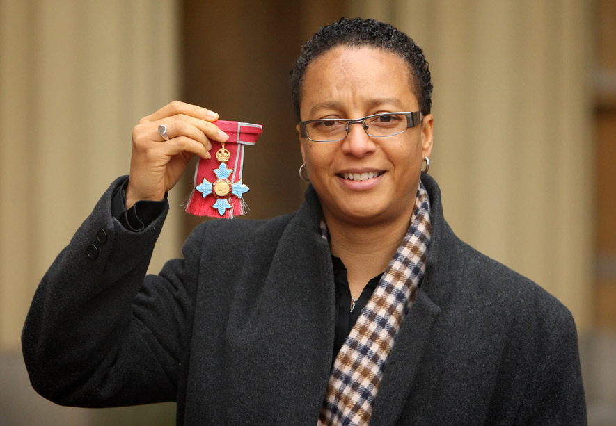 Hope Powell proudly displays her CBE.